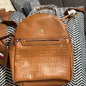 New TH small bag pack with card holder.